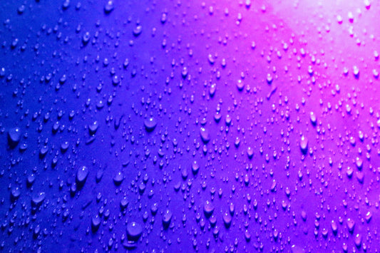 a close up of water droplets on a window