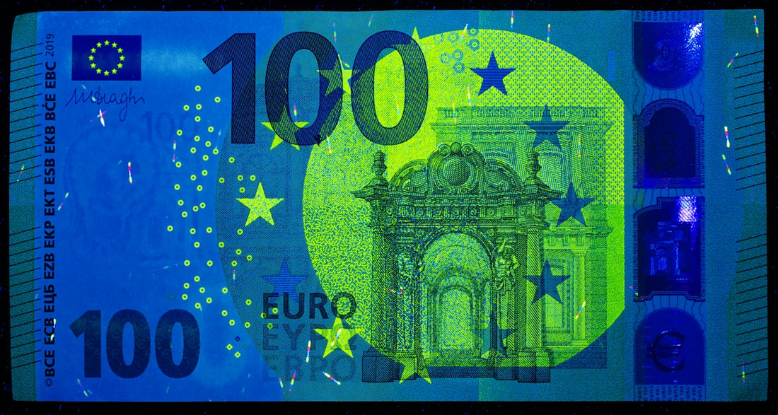 A ten euro bill with a blue background